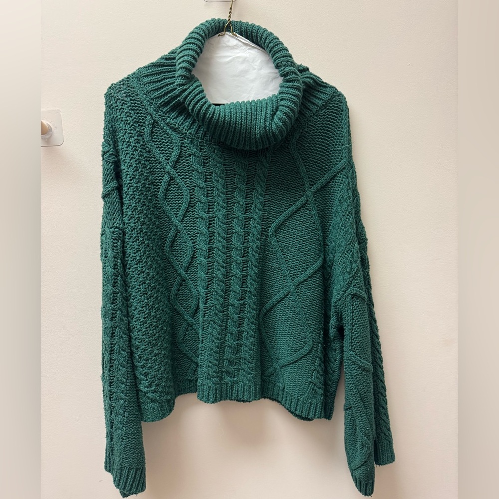 Green cable knit sweater